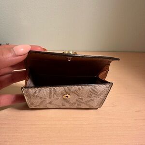 Michael Kors Cream Wallet with Structured Design and Silver Hardware